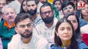 Couple in Traditional Attire Engages in Spiritual Chants During Ashram Visit, Reuniting with Guru After December Meeting